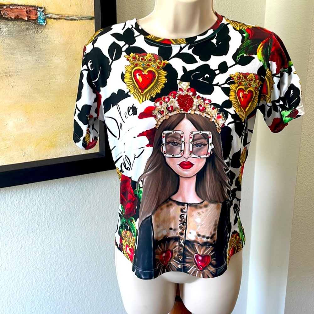 FUN AND FUNKY T-shirt in small..says “Dolce and Gabbana”. Real? Don’t know.